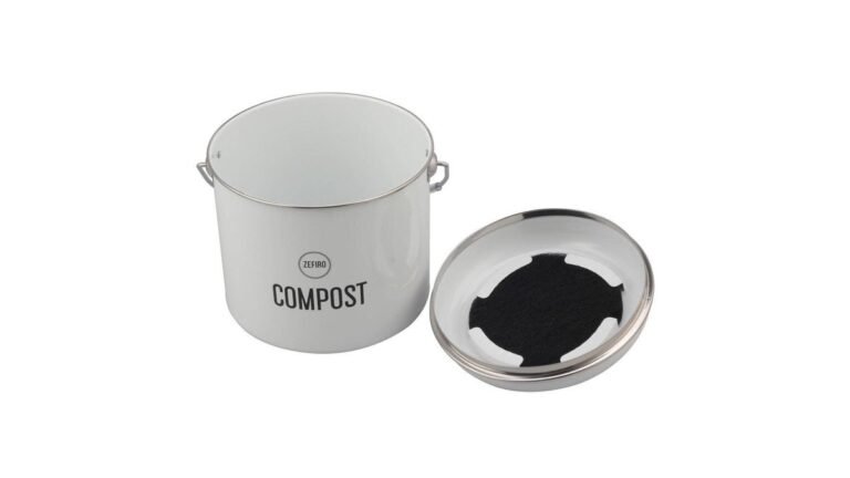Reusable charcoal filter composter on a kitchen counter beside vegetable scraps